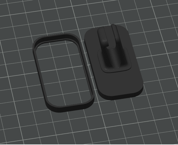 Separate front trim ring beside the Dash Badge mounting clip and base
