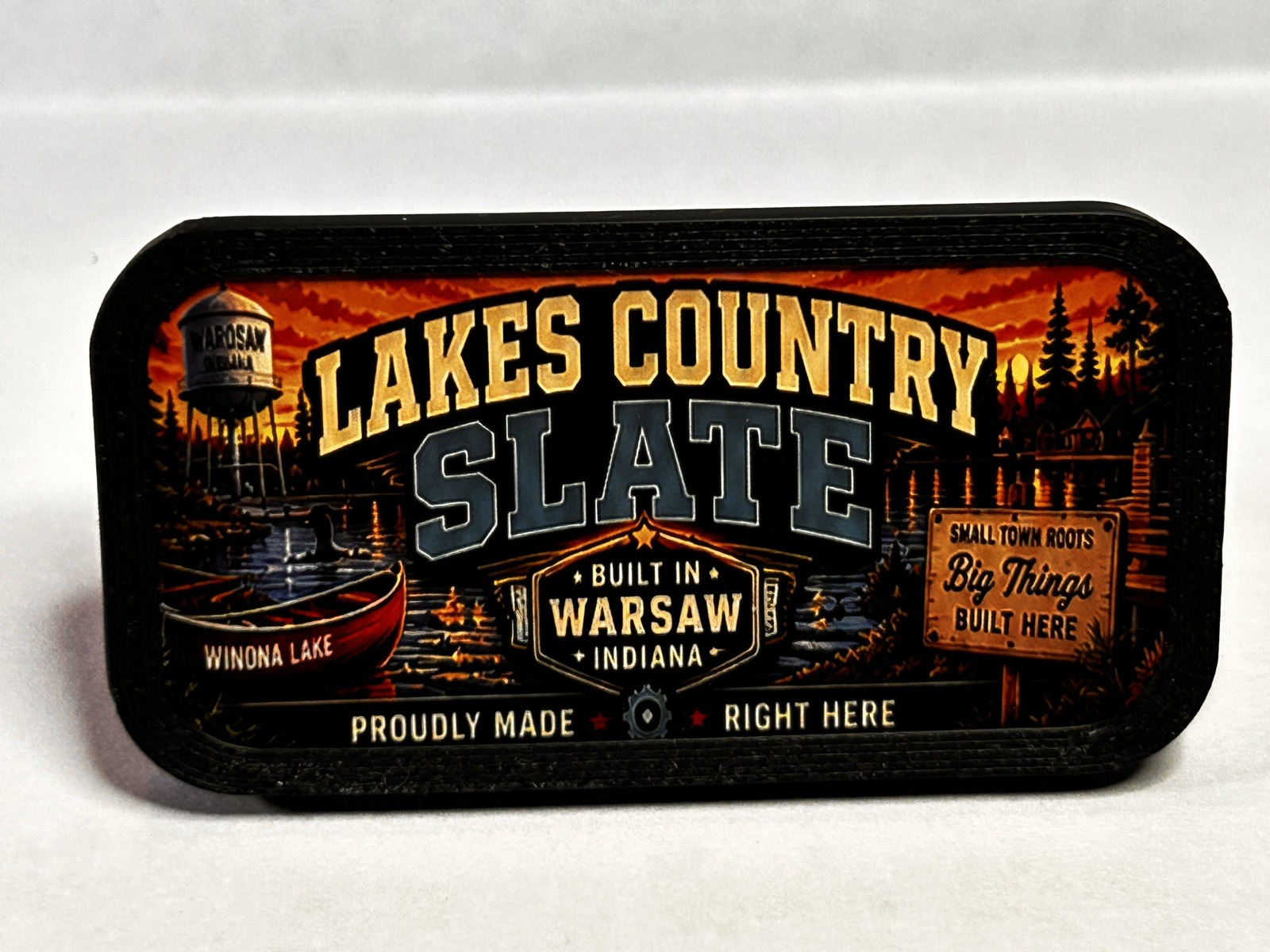 Front view of the accessory clip with the Lakes Country Slate sticker installed