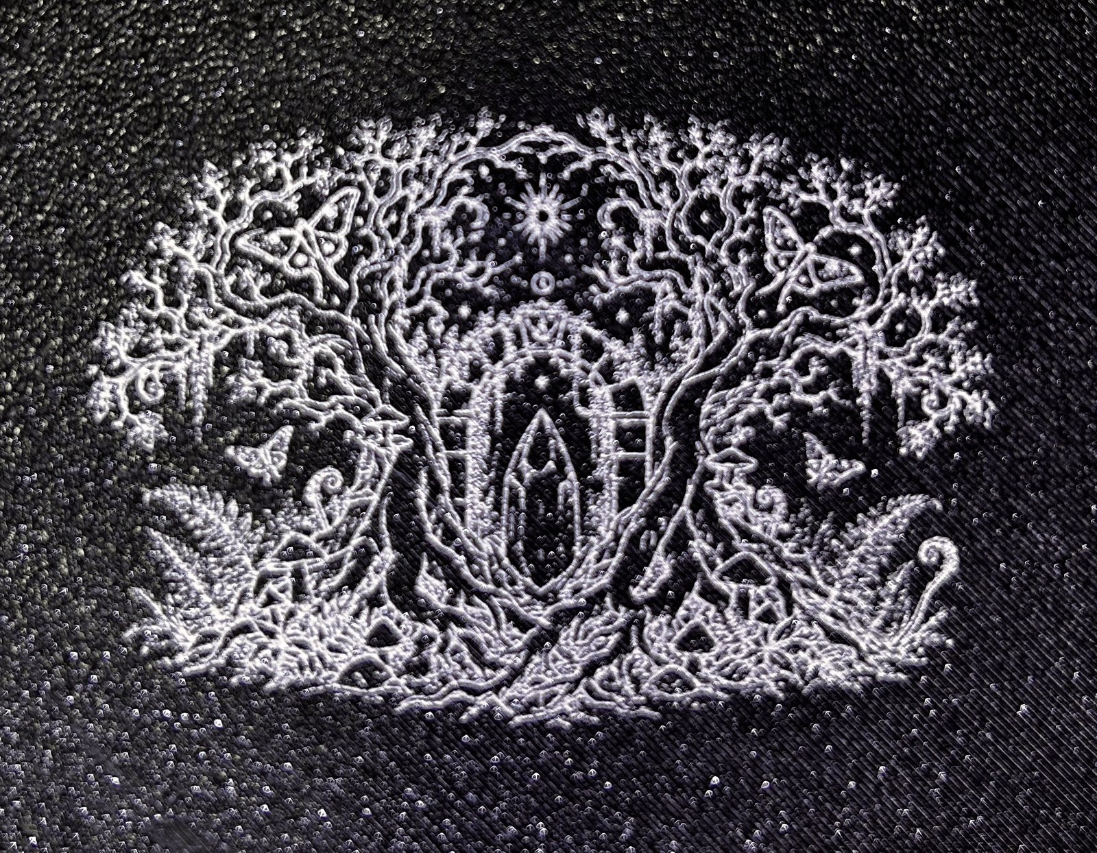 Mystical Tree laser graphic on black printed plastic